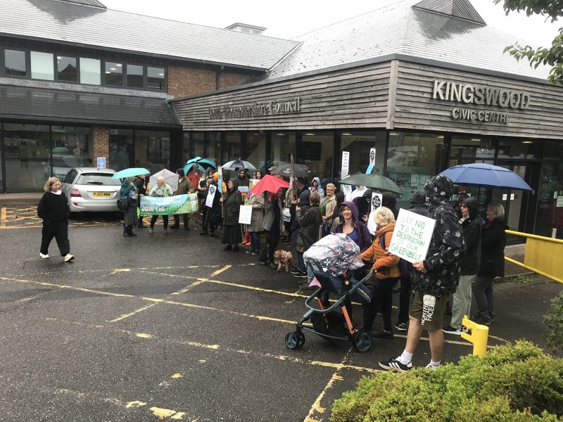 Dozens of campaigners turned out in the rain to protest at the development plans