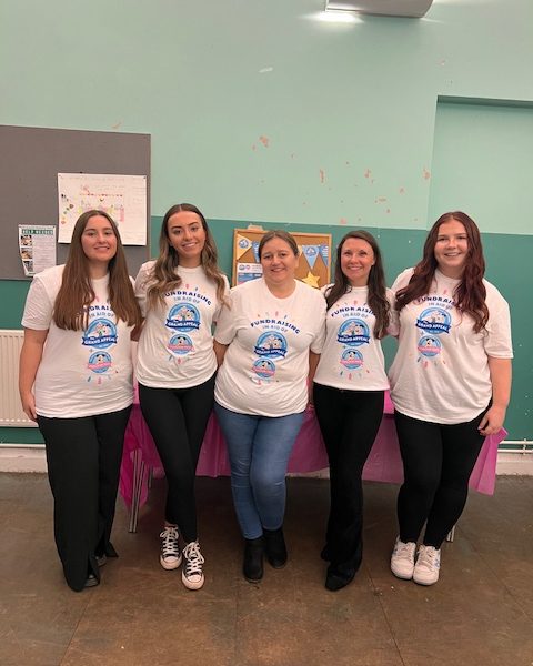 Travel agents Shellie Melhuish, Lydia Canavan, Amanda Dickson, Jane Drake, and Isabelle Seretny from Hays Travel Kingswood