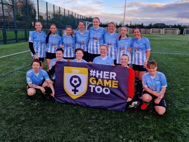 Longwell Green Girls with the Her Game Too banner